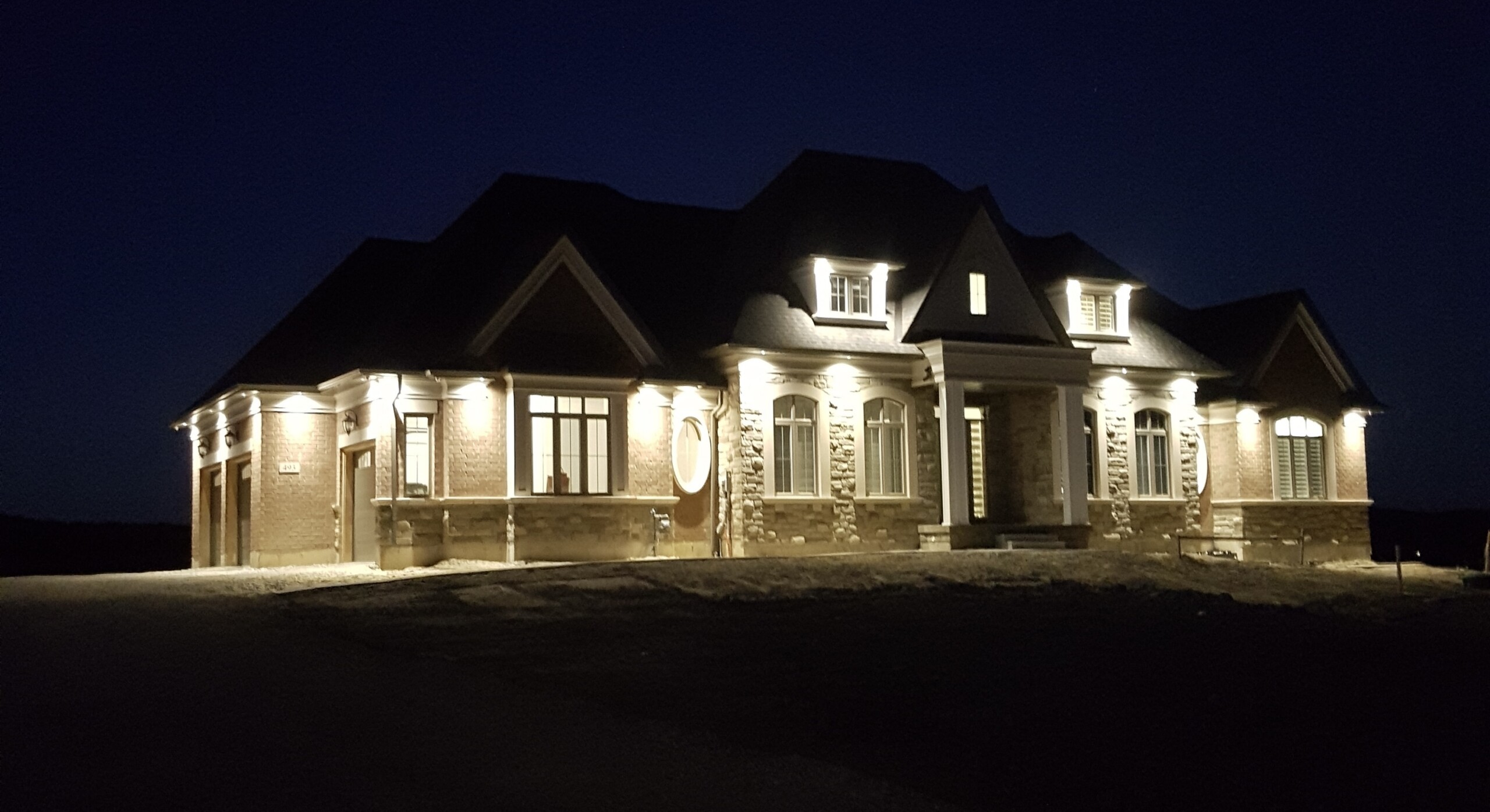 Pot lights installation on a home exterior in Markham Ontario