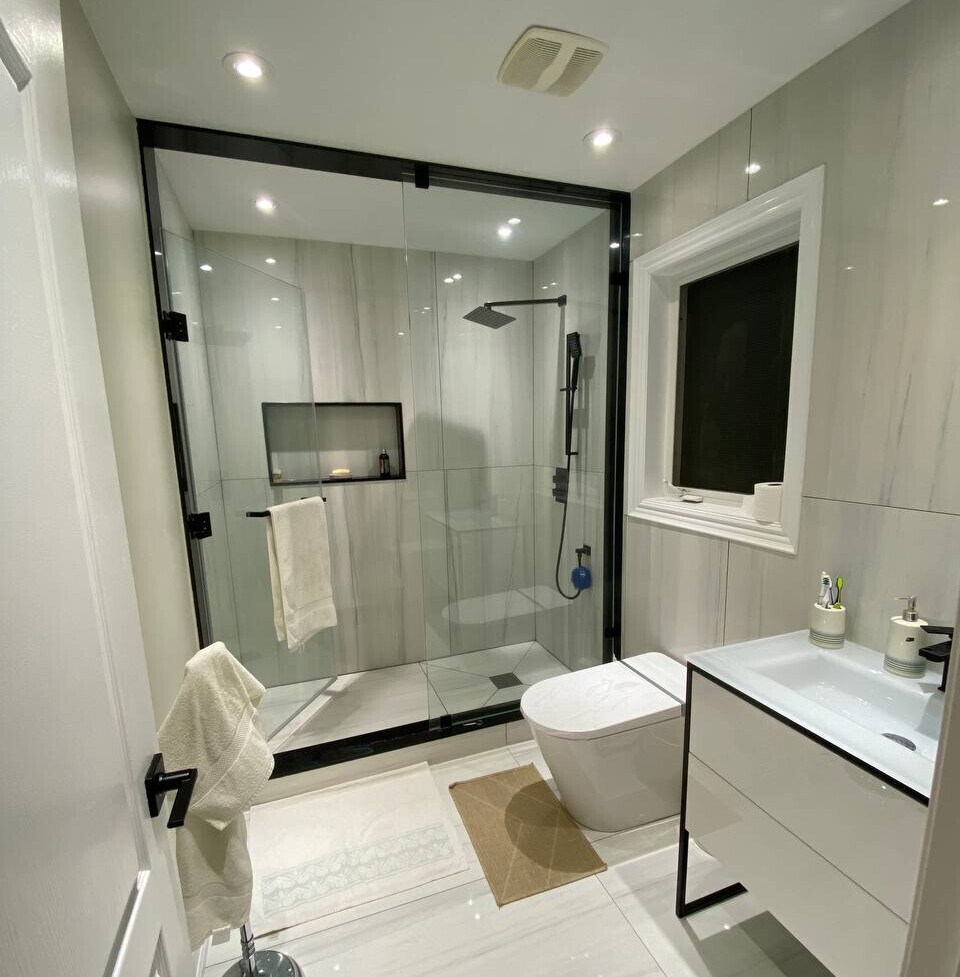 Recessed pot lights installed in a Toronto bathroom